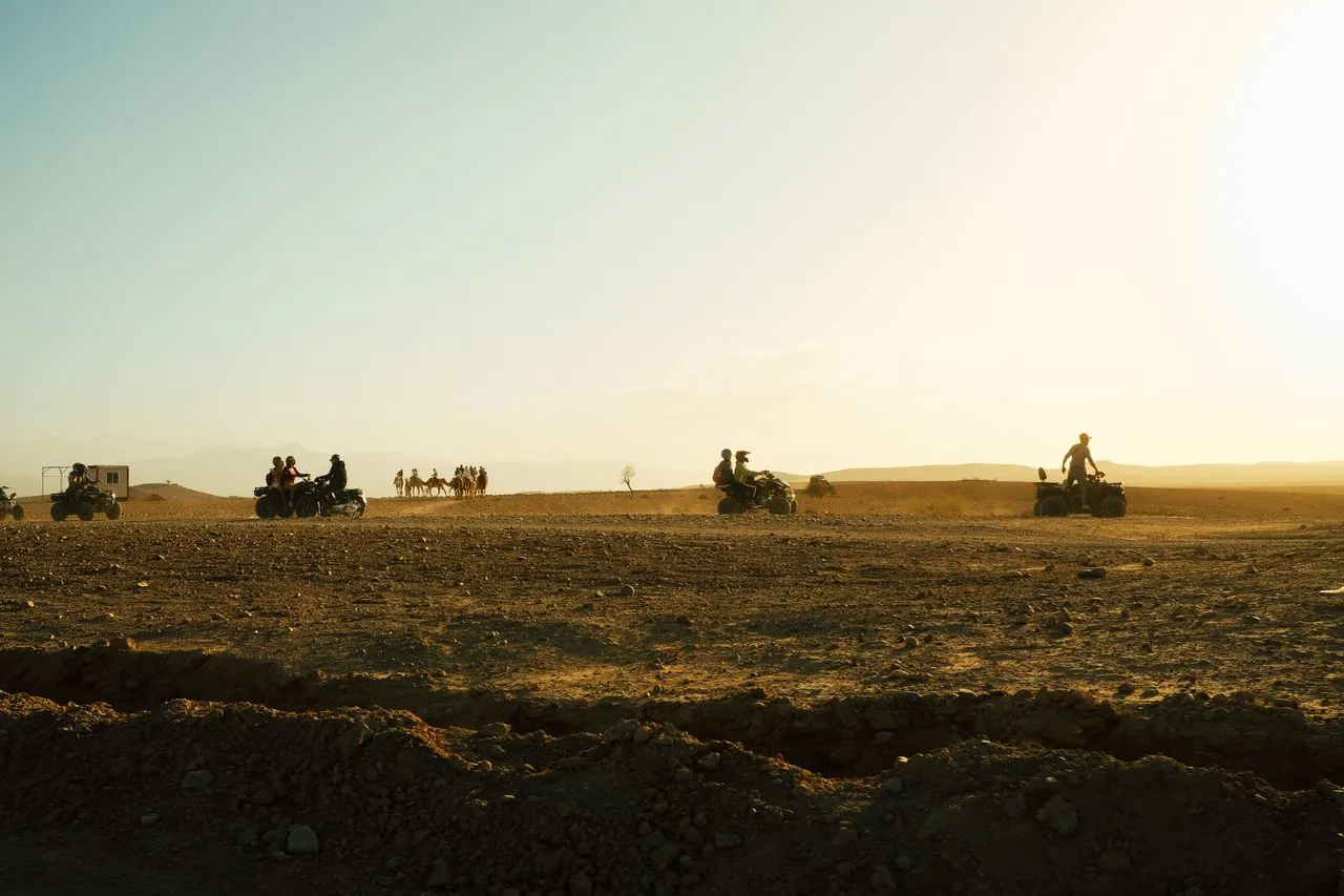 Quad bikes crossing the Merzouga desert dunes